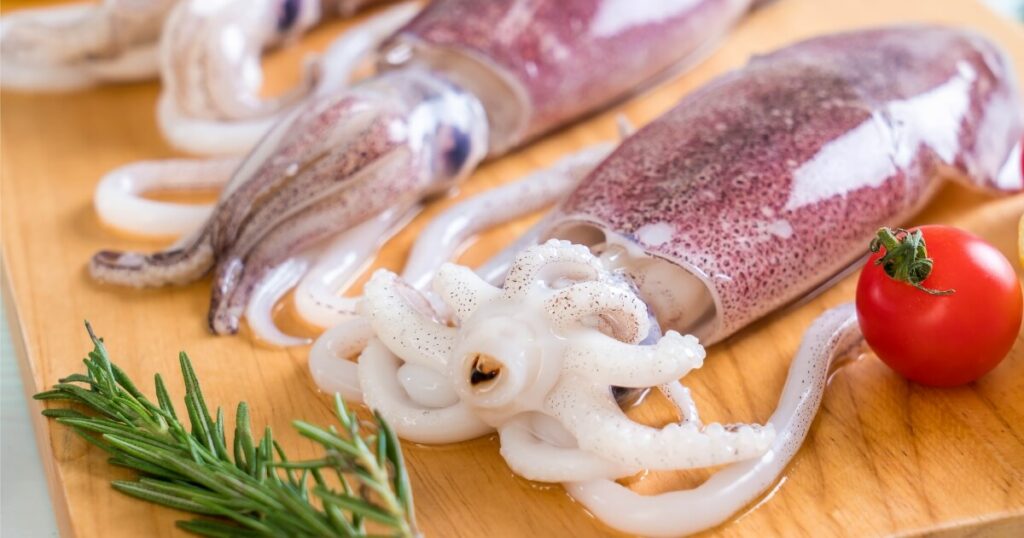 raw squid on cutting board