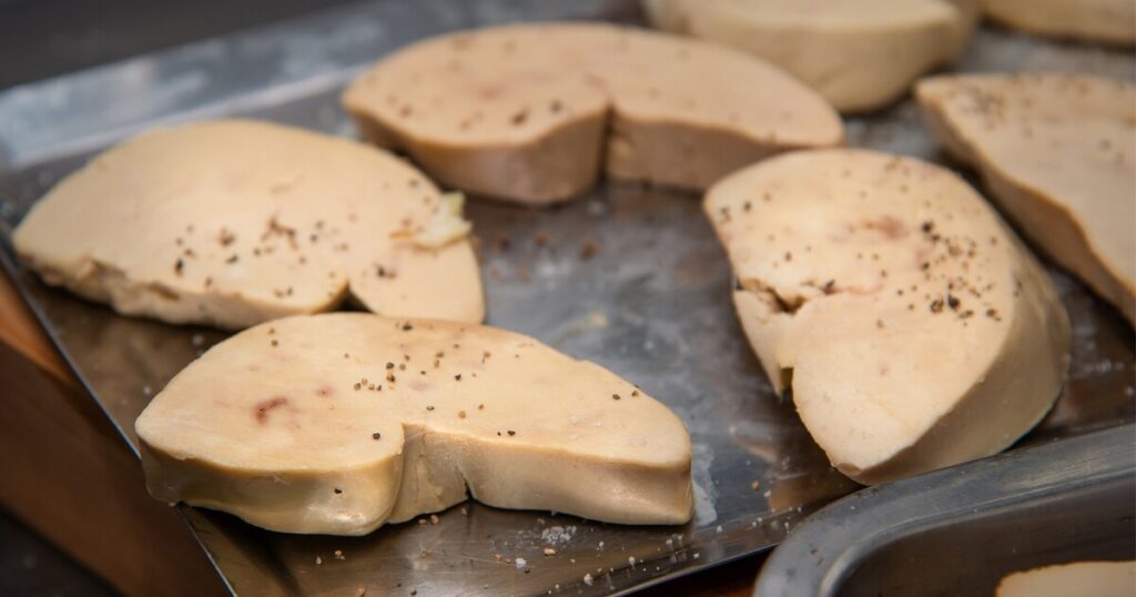sliced raw duck liver